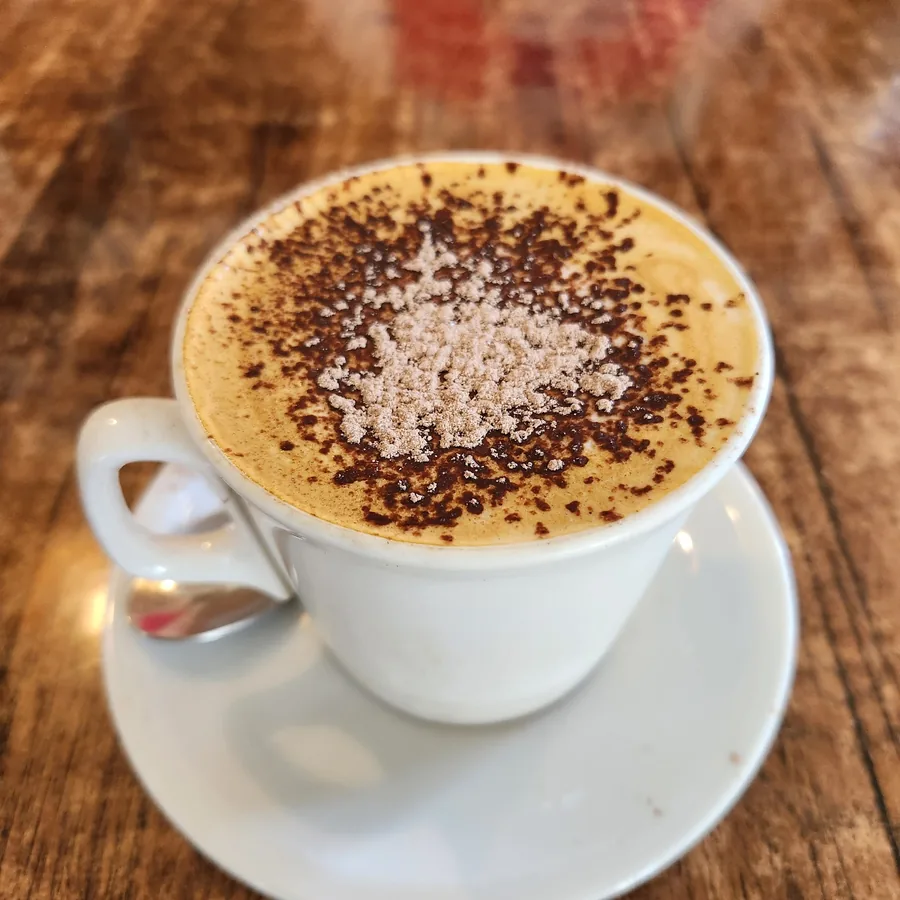 Cappuccino on a timber table